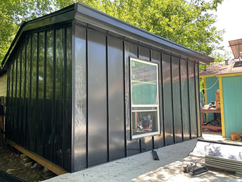 Black standing seam metal wall panels for Roof Inspection in Harpswell