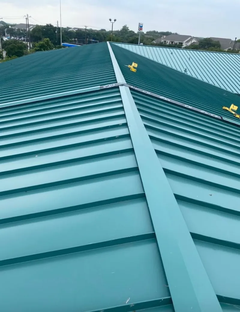 Green commercial metal roof ridge and valley for Metal Roof Repair in Harpswell